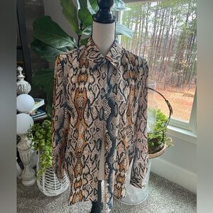 Woman’s Faux Snake print button down size L in gently used condition